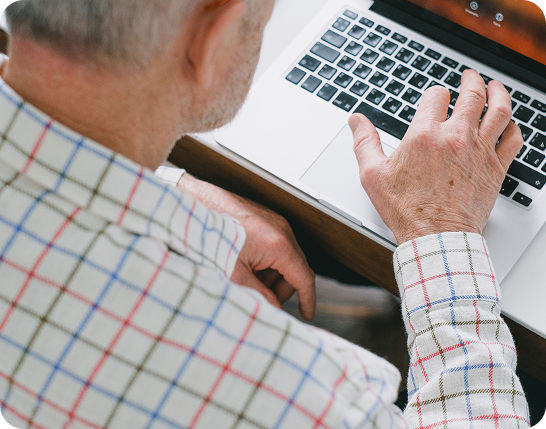 Person sharing information at a laptop